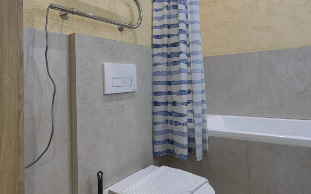 V Tsentre Goroda Apartments