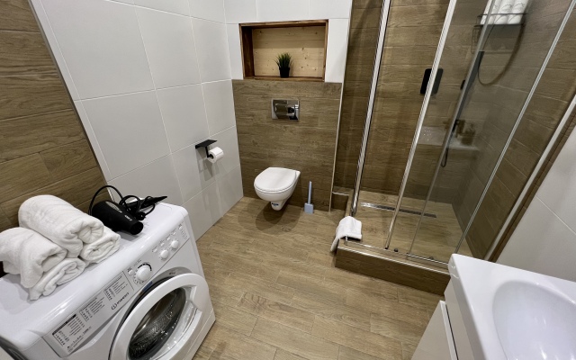 Skandinavskiy uyut na solnechnom kruge Apartaments