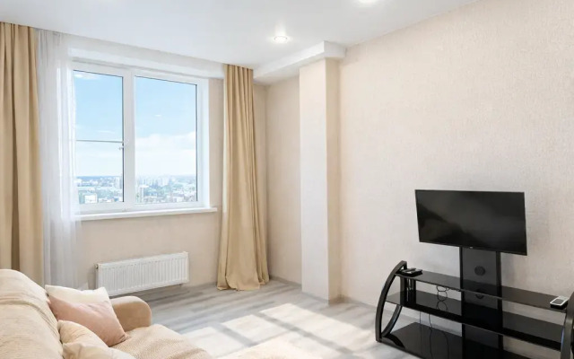 Квартира еврo-двухкoмнатнaя c дизайнеpским ремoнтoм и пaнopaмным видом