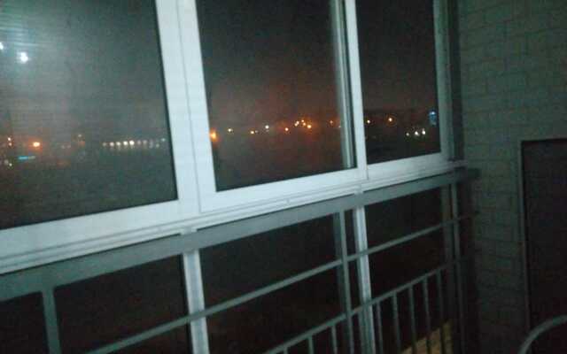 V Tsentre U Reki Apartments