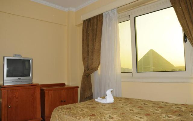 Курортный Отель Tiba Pyramids Hotel