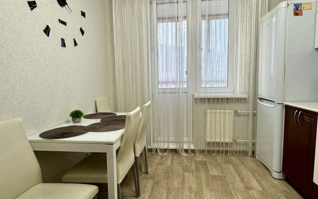 Квартира Уютная в центральном районе с охраняемой парковкой