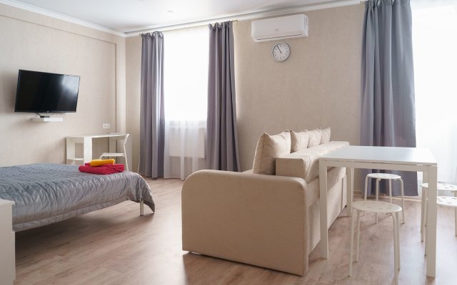 Studiya lyuks na Pukhova 56 Apartments