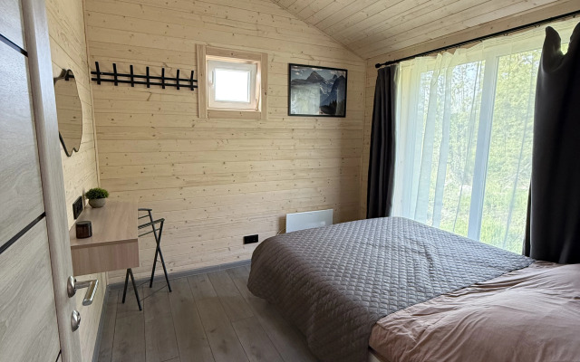 Na Granitse S Lesom Private House