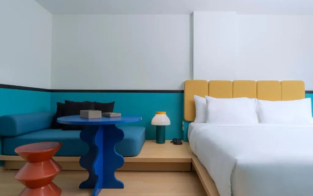 Отель The Grass Serviced Suites