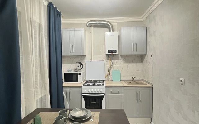 Квартира Тихая уютная студия вблизи от центра города