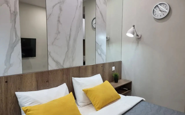 V Tsentre Goroda Apartments