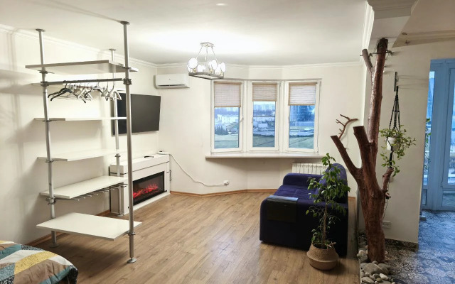 Апартаменты Студия с камином, деревом и видом на реку