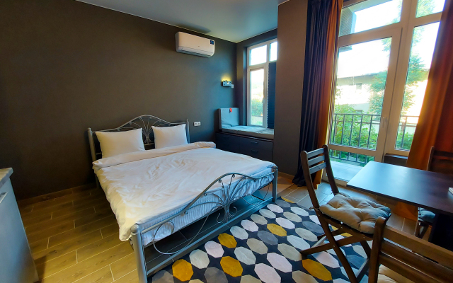 Апартаменты Уютная студия у Олимпийского парка