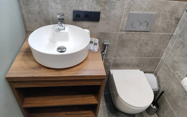 Апартаменты Уютная студия с панорамной лоджией с бесконтактным заселением