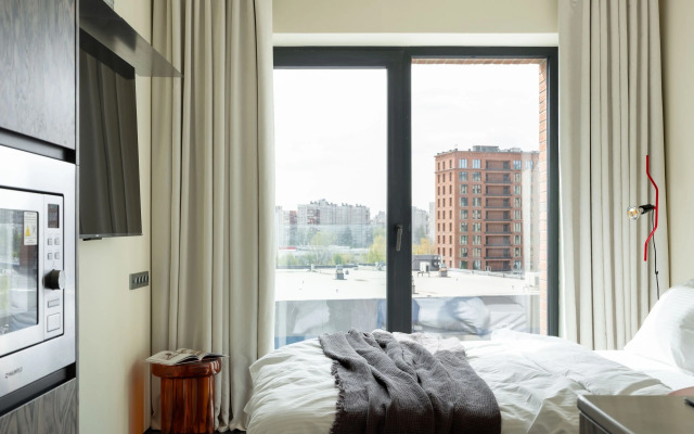 Ryadom S Nevoy Na Uralskoy Ulitse Apartments