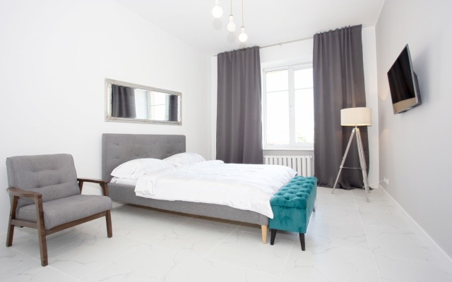 Stilnye apartamenty s dvumya spalnyami v tsentre Apartments
