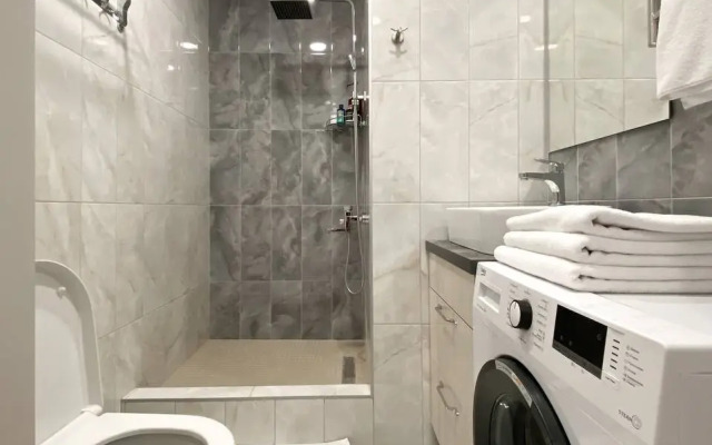 Апартаменты двухкомнатные с двумя кроватями, гардеробной и кухней-гостиной