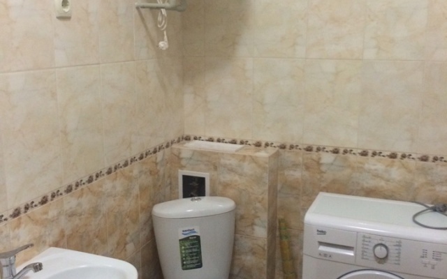 V Tsentre Goroda Apartments