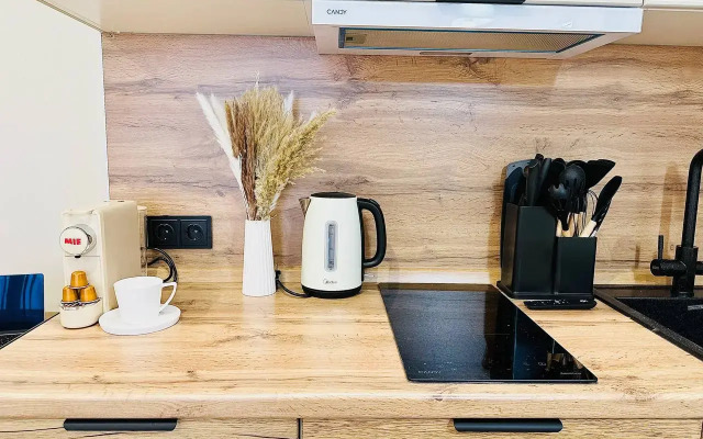 Квартира Поделам с балконом на 14 этаже у арены Трактор