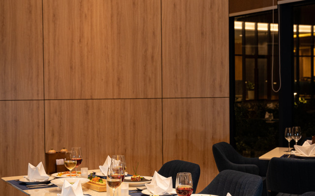 Отель The Light Beach Residences by Arena