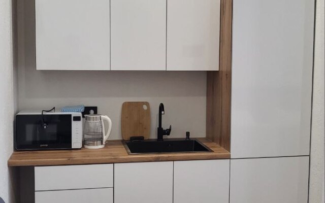 Апартаменты Современная студия в центре