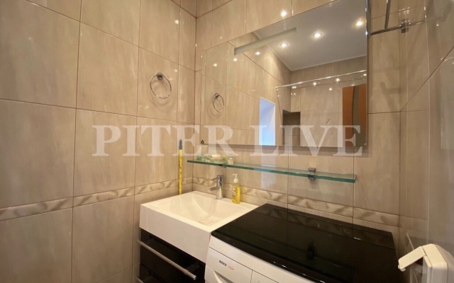 V Tsentre Ryadom S Naberezhnoy Apartments