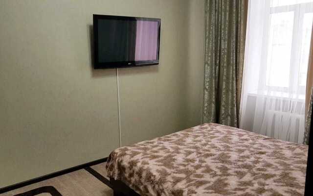 V Tsentre Goroda Apartments