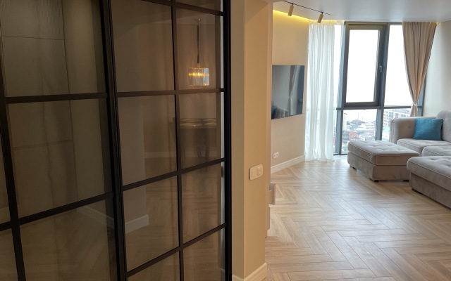 S neveroyatnym vidom na more i zakaty Apartments