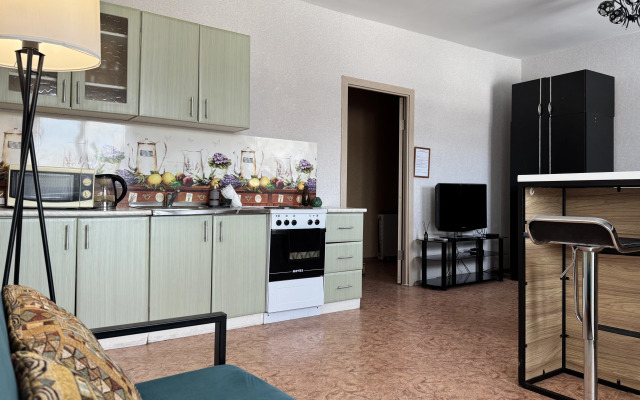 Na Romana Kuzovatkina 18 Flat