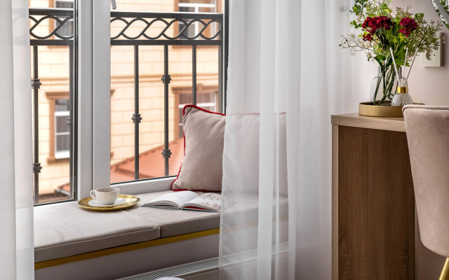V Samom Tsentre Flat