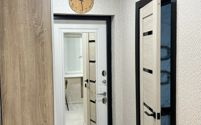 Апартаменты Уютная студия напротив Парка и Университета в центре Нефтяников