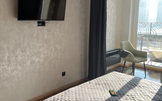 Komfortabelnye S Terrasoy Vozle Planety Apartments