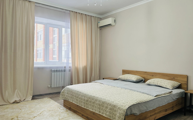 Апартаменты Уютная квартира с хорошим видом из окна