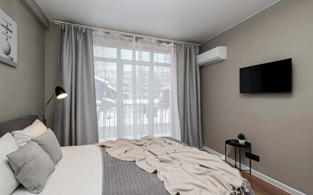 Квартира Уютная строгая студия у Цирка