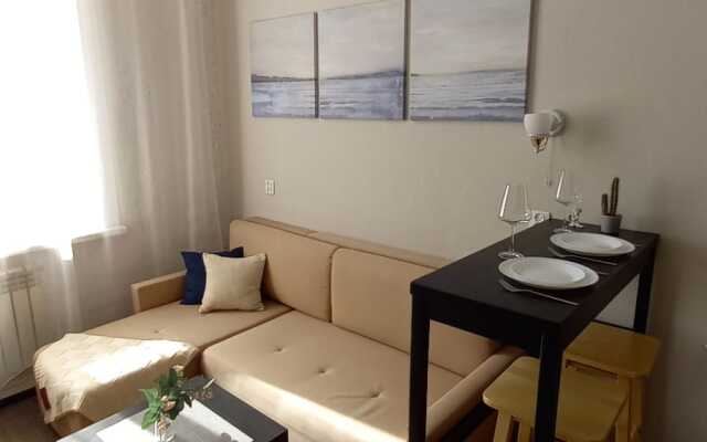 Апартаменты Уютная Двухуровневая Студия в Центре Города