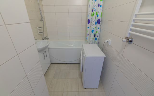 Апартаменты Двухкомнатная Квартира на Мансардном Этаже