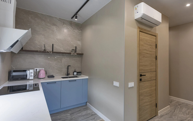 V Tsentre Goroda Apartments