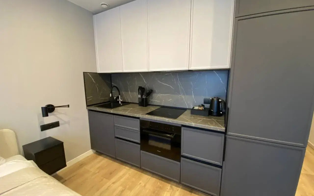 Квартира Дизайнерская студия с оборудованной кухней