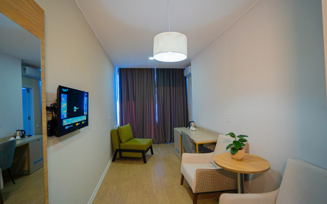 Komunna Luxe Apartment Hotel