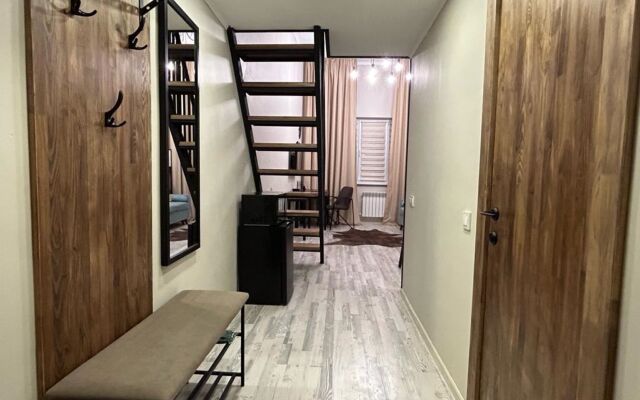 Апартаменты Двухуровневая студия Loft в центре города
