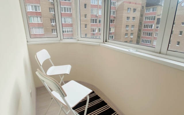 V Tsentre u Areny Apartments