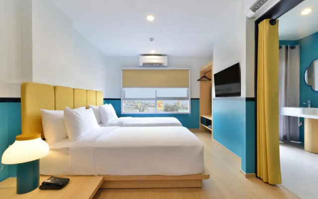 Отель The Grass Serviced Suites