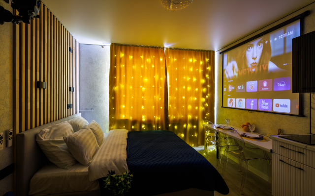 Meduza Apart uyutnye kino-studii s proektoramy 2 Apartment