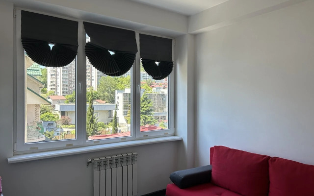 Na Volzhskoy 32a Apartments