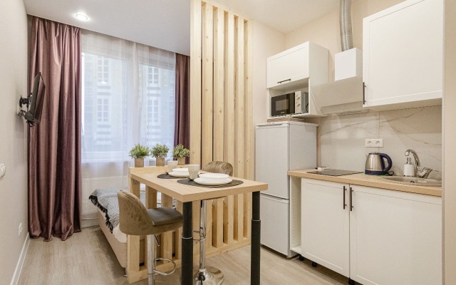 Uyutnaya studiya v 10 minutakh ot Vko Apartments