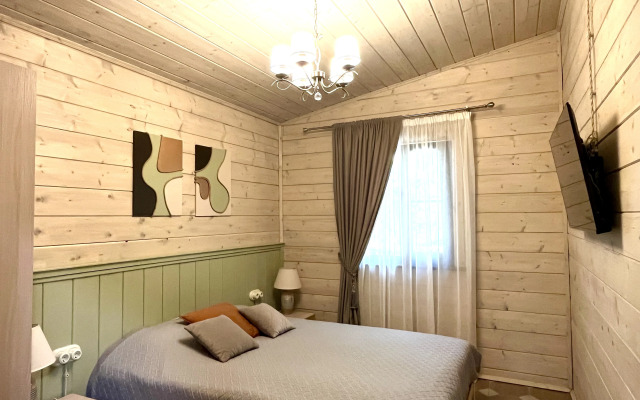 Лесной домик на берегу Озера Волго на Селигере - коттеджи Сосновый бор