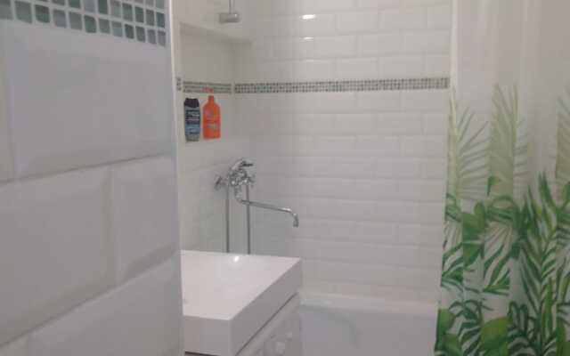 V Tsentre U Reki Apartments