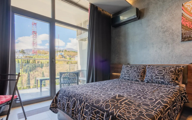 LS-Black Strong S bokovym vidom na more Apartments