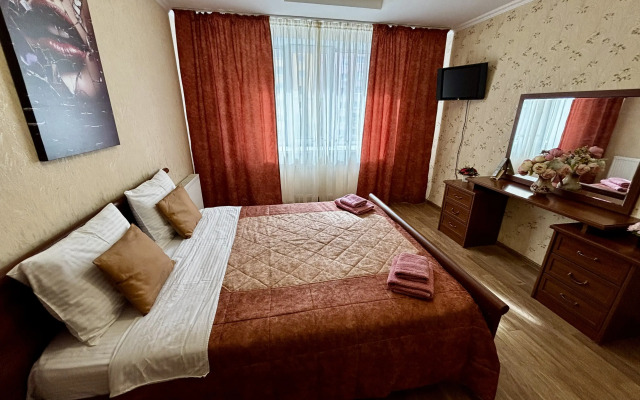 Апартаменты Уютная двухкомнатная квартира в центре города