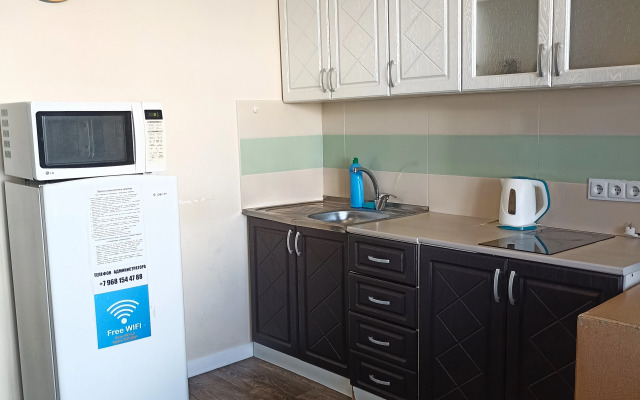 Апартаменты Cтудия в 203 Микрорайоне 1