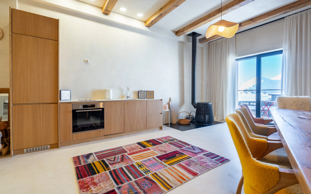 Apartamenty Prostornye apartamenty s 2 spal'nami i 2 vannymi v zdanii NEO ski-in/ski-out Novyj Gudauri