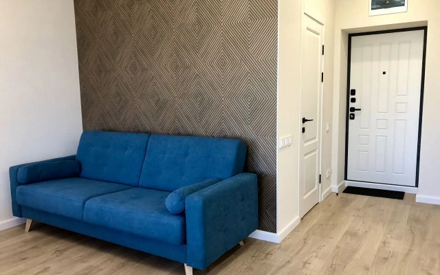 Квартира Уютная cтудия в дoме комфорт-клaсcа Рoманoв New Life