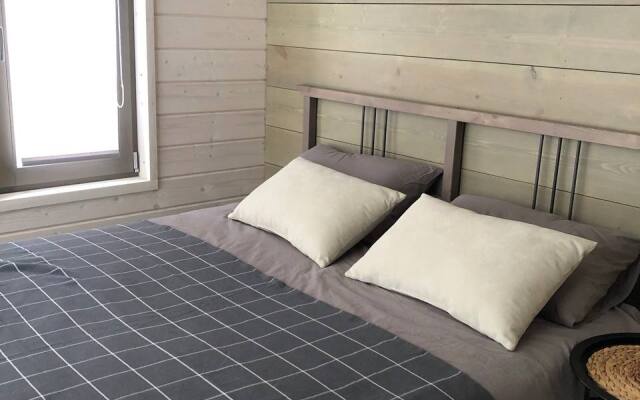 Atmosfernyy s kaminom okolo lesa Dacha.Les Guest house