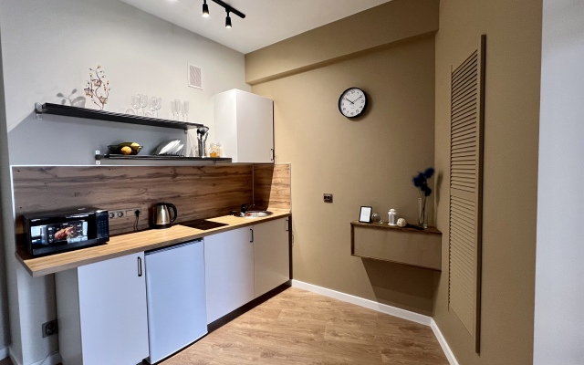 Skandinavskiy uyut na solnechnom kruge Apartaments